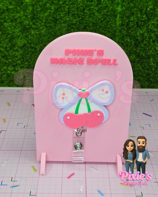 Lilac Cherry Coquette Badge Reelz